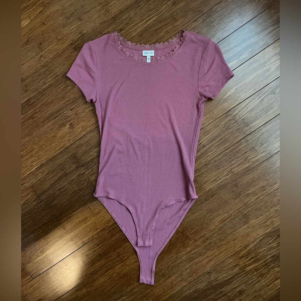 Pink bodysuit